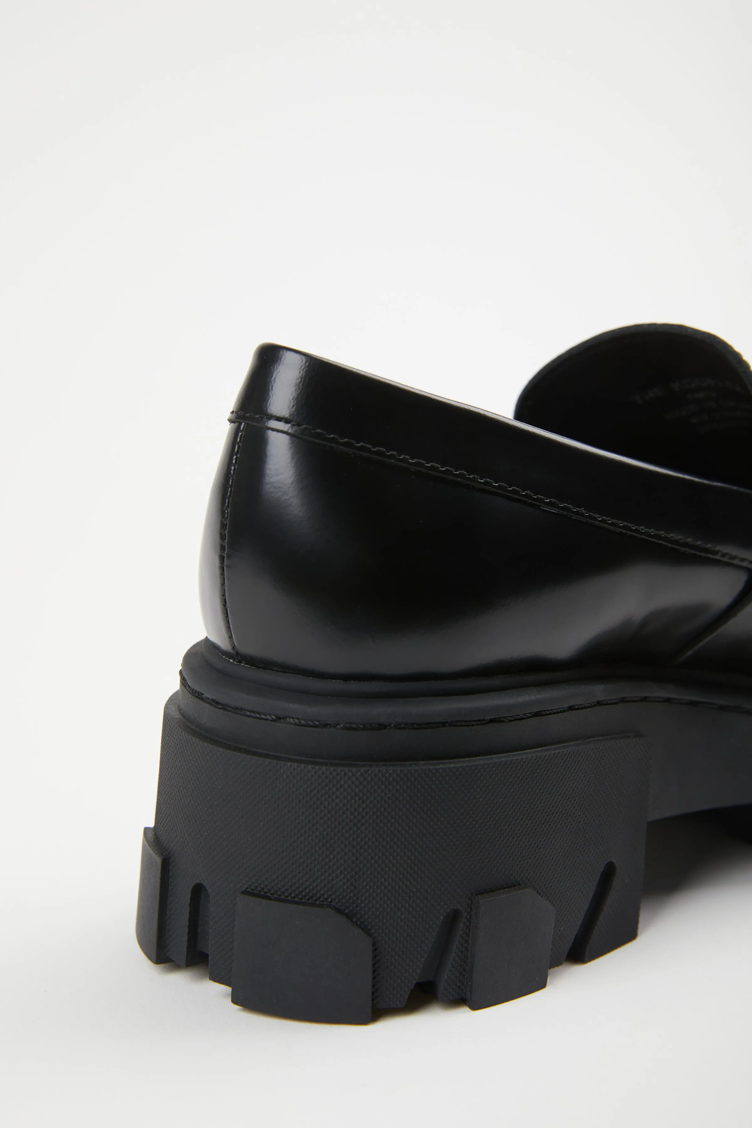 CHAIN-EMBELLISHED LEATHER LOAFERS