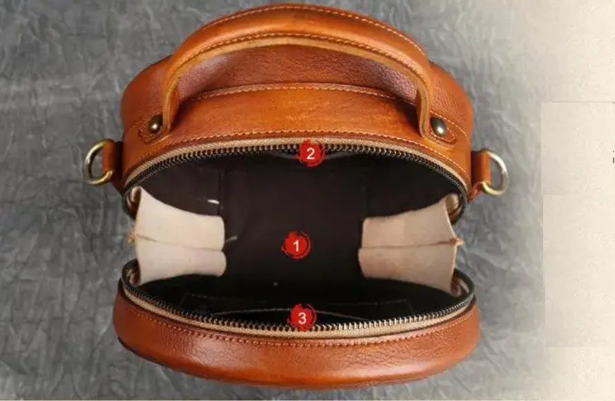 Embossed Circle Leather Crossbody Bag