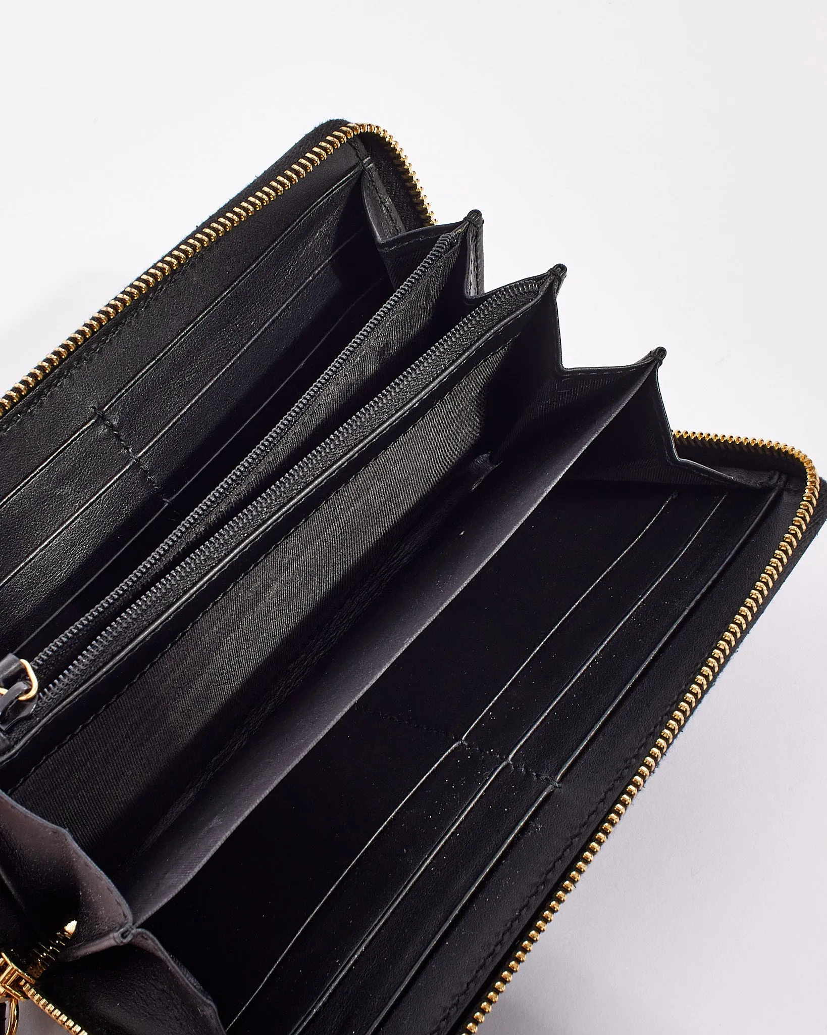 Gucci Black Calfskin GG Embossed Zip Around Wallet