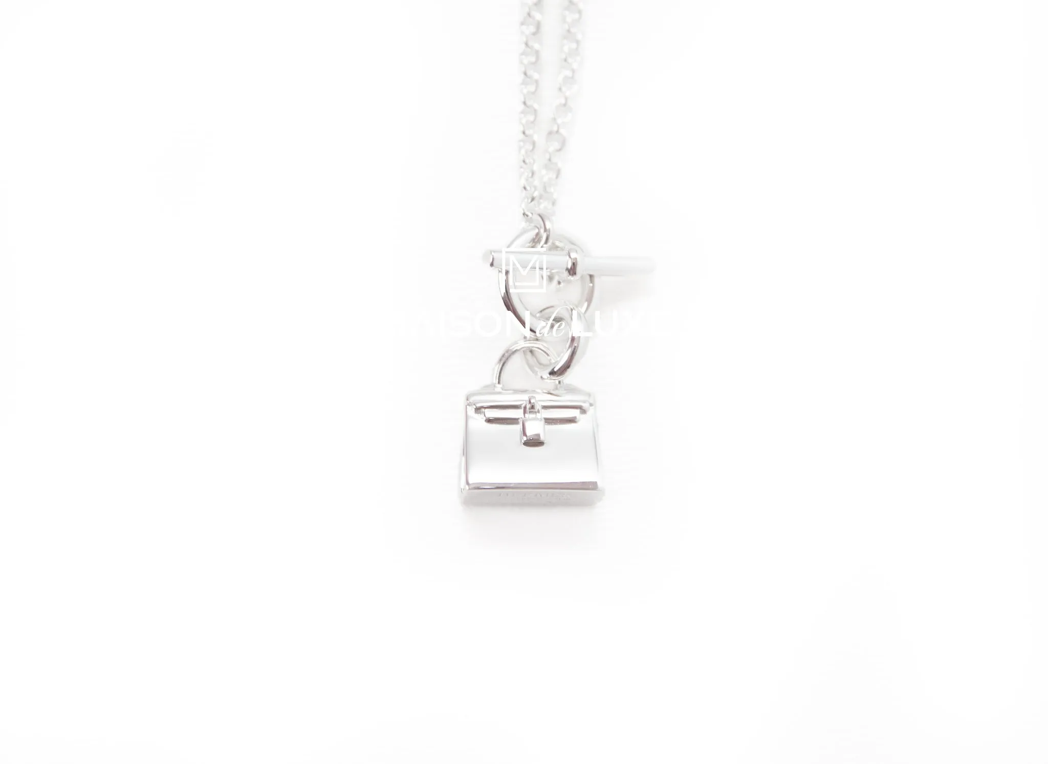 Hermes Silver Amulettes Kelly Pendant