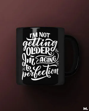 I am aging to perfection printed mugs