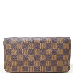 LOUIS VUITTON Zip Around Damier Ebene Wallet Brown