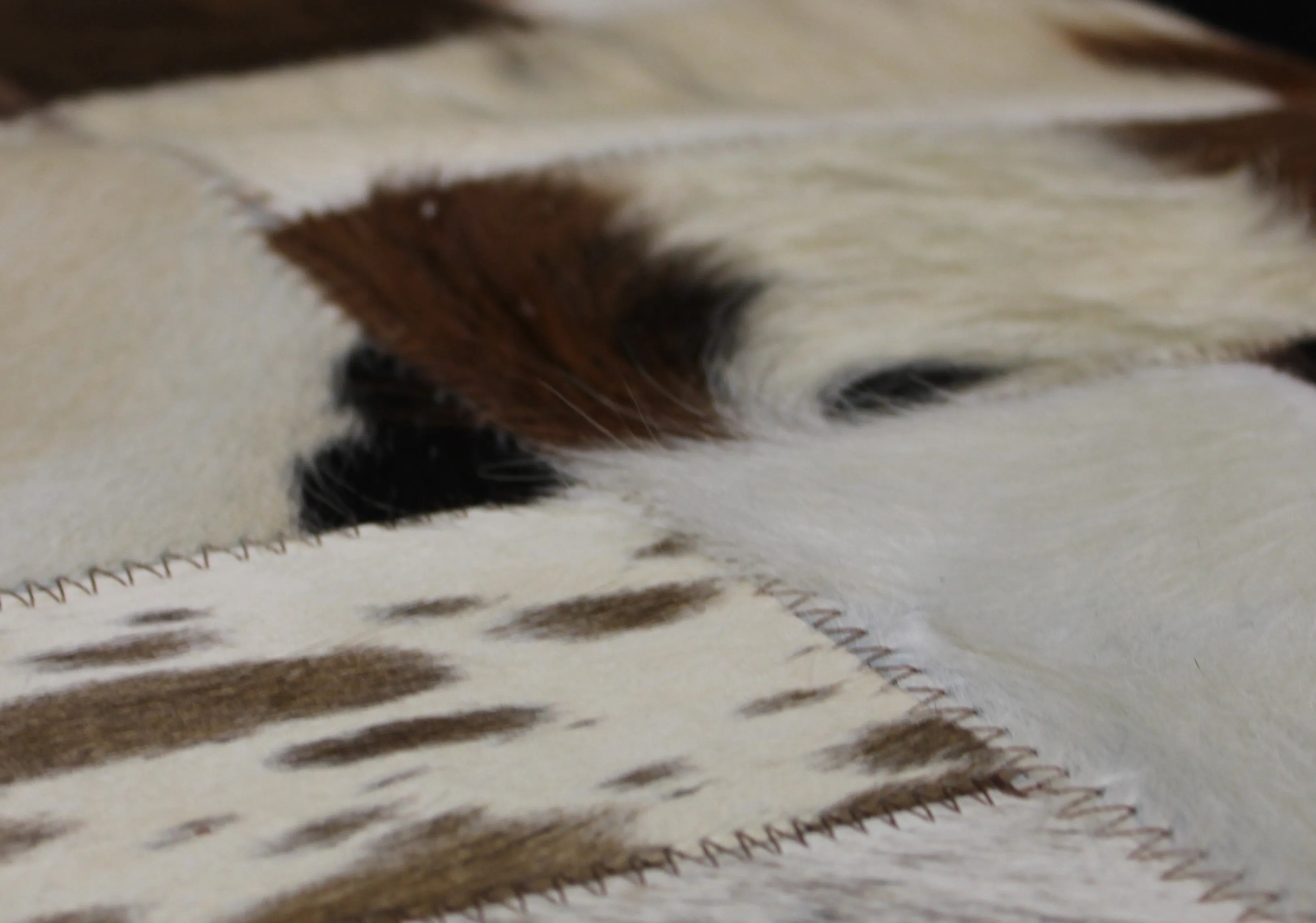 Tricolor Patchwork Cowhide Rug – 7.10ft x 5.10 ft Premium Cowhide Rug