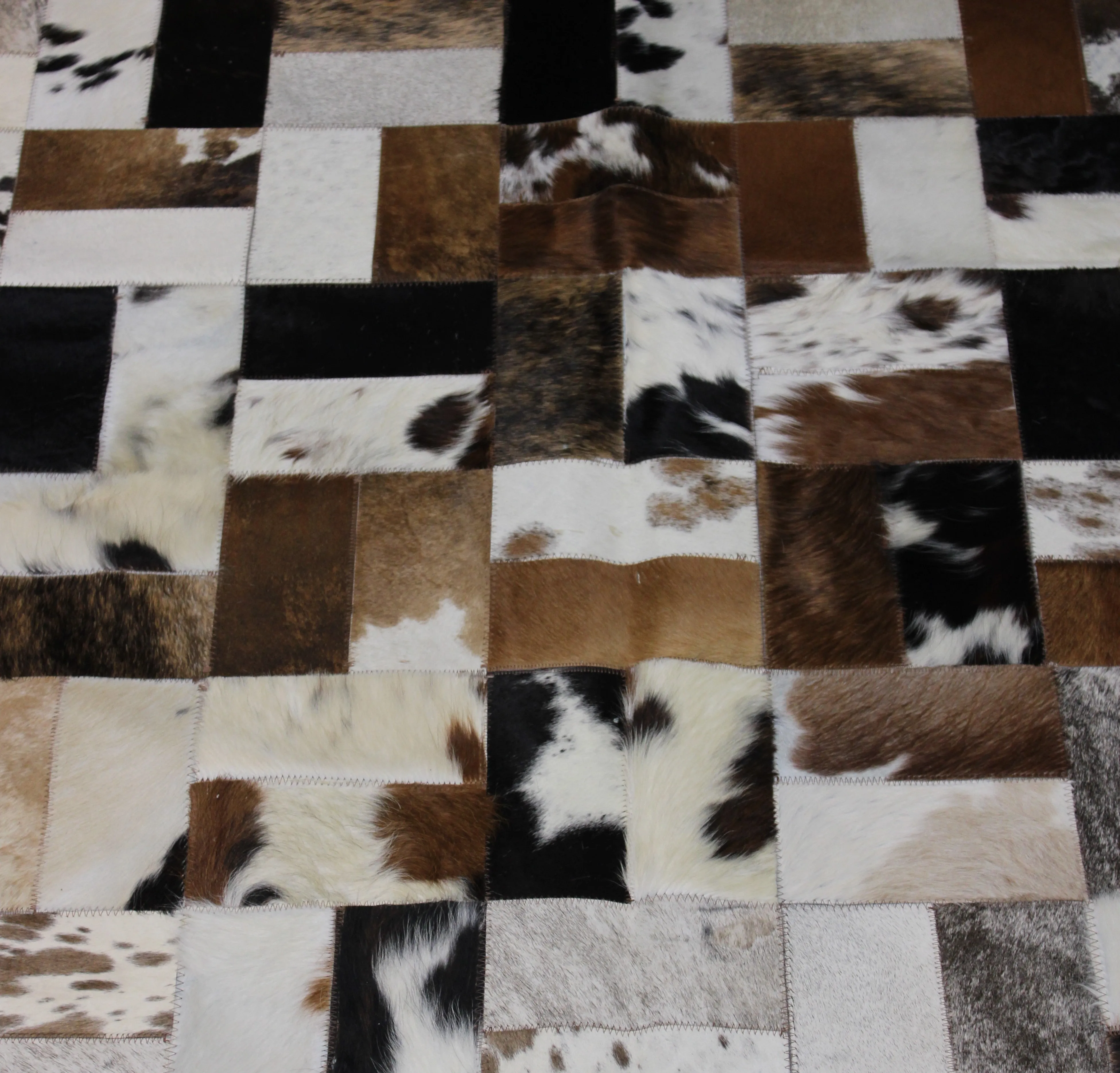 Tricolor Patchwork Cowhide Rug – 7.10ft x 5.10 ft Premium Cowhide Rug