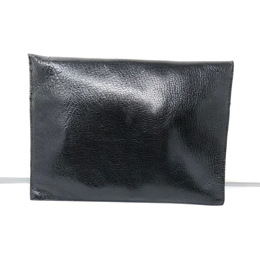 Vintage: Labagagerie black leather rounded flap clutch